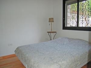 Ένα ή περισσότερα κρεβάτια σε δωμάτιο στο La Turbie Apartment, La Turbie