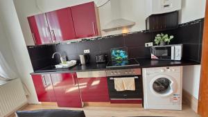 Kuchyň nebo kuchyňský kout v ubytování ELENA flat Orchidee Duisburg Zentrum