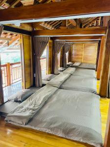 Postel nebo postele na pokoji v ubytování Laco Homestay