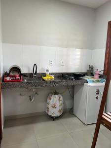 Η κουζίνα ή μικρή κουζίνα στο Thomaz House Macapaz
