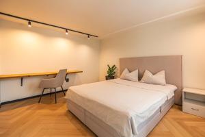 Katil atau katil-katil dalam bilik di Origin Central Apartment