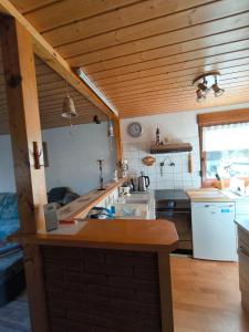 a kitchen with a sink and a counter top at Haus Sonneneck 2 in Tanna +11 photos