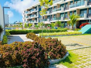 Κήπος έξω από το Makia Beach Experience # Flat Térreo B-019