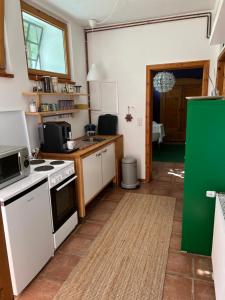 Η κουζίνα ή μικρή κουζίνα στο Kleine Wohnung auf dem Land