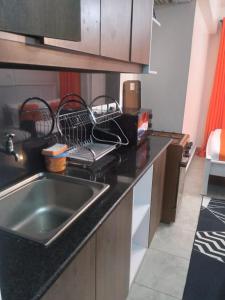 Η κουζίνα ή μικρή κουζίνα στο Cozy Stays