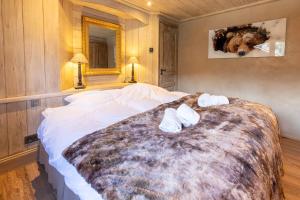 Ένα ή περισσότερα κρεβάτια σε δωμάτιο στο Chalet Altaïr