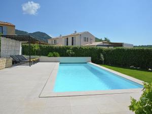 a swimming pool in the backyard of a house at Villa in Malaucène near Mont Ventoux in Malaucène