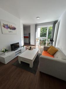 Postel nebo postele na pokoji v ubytování Cube Apartamenty