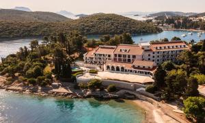 an aerial view of a resort on the water at Aminess Younique Liburna Hotel in Korčula
