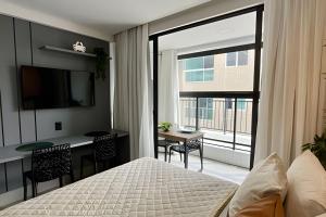 TV a/nebo společenská místnost v ubytování Flats a 50m do mar Get By Side - MyFlats Hospedagens