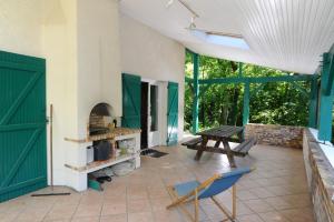Balkón nebo terasa v ubytování Maison En Bord De Rivière