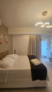 Postel nebo postele na pokoji v ubytování Charme do Dido + 18 fotografií