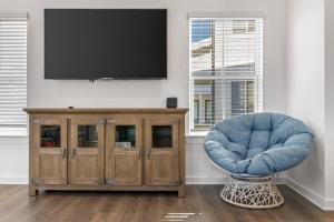 TV/trung tâm giải trí tại Wolf Bay Hangout