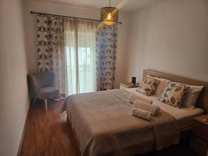 Ένα ή περισσότερα κρεβάτια σε δωμάτιο στο Apartamento Atlantico Tavira