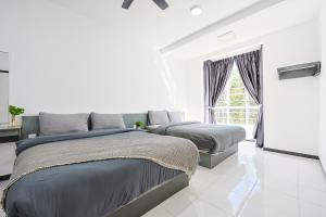Postel nebo postele na pokoji v ubytování Happy Nest Cameron Highland 10 Pax Family Homestay Clover Home 5-23