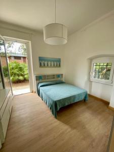 En eller flere senge i et værelse på Casa del Borgo