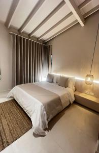 a bedroom with a large bed with a window at Macondo House Private Heated Pool in Medellín +48 photos