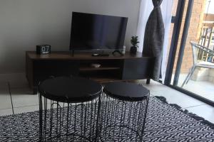 TV a/nebo společenská místnost v ubytování The Blyde Riverwalk Estate