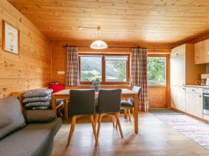 a dining room with a table and chairs at Am Bauernhof Top 1 in Alpbach +15 photos
