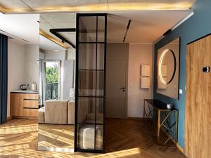 Postel nebo postele na pokoji v ubytování Apartament Złota Polana Parku