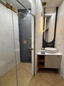 Koupelna v ubytování Apartament Złota Polana Parku + 10 fotografií