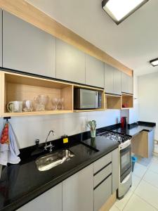 Η κουζίνα ή μικρή κουζίνα στο Apartamento Charmoso Morumbi