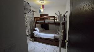 a room with two bunk beds in a room at portosaid chelat-portsaid in `Ezbet Shalabi el-Rûdi +42 photos
