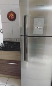 Kuchyň nebo kuchyňský kout v ubytování Apto compacto com linda vista no centro da cidade