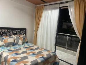 Postel nebo postele na pokoji v ubytování excelente apartamento en Alvarado Tolima