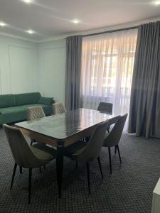 Χώρος καθιστικού στο Aq-Jaiyq Halal Hotel