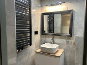 Koupelna v ubytování Apartamenty Stokrotka + 56 fotografií