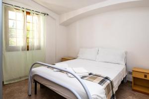 Ένα ή περισσότερα κρεβάτια σε δωμάτιο στο Sea Sound - Casa Vacanze