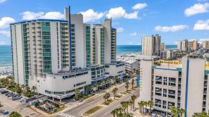 an aerial view of a city with buildings and the ocean at Avista Resort in Myrtle Beach