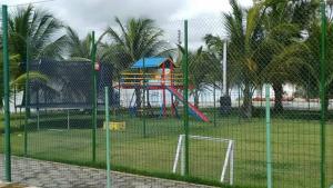 a park with a playground with a playground at O Cantinho da Patricia e Tony in Macaíba