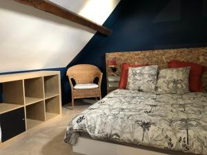 Postel nebo postele na pokoji v ubytování Maisonnette de campagne avec jardinet