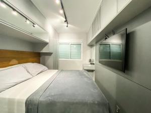 Ένα ή περισσότερα κρεβάτια σε δωμάτιο στο Apt todo mobiliado 2 quartos e Office com Cama Alto Padrão Cuiabá +20 φωτογραφίες