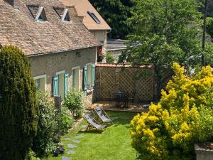 Zahrada ubytování Maisonnette de campagne avec jardinet