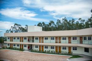 an external view of a building at Decio Hotel - Presidente Venceslau Antigo KHotel in Presidente Venceslau
