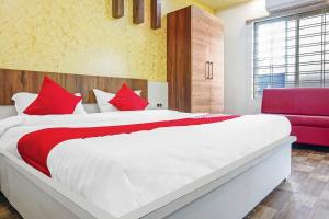 Postel nebo postele na pokoji v ubytování Hotel O CeeRock