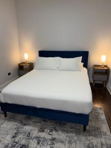 Ένα ή περισσότερα κρεβάτια σε δωμάτιο στο Feel at home