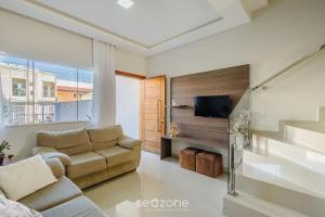 Μια τηλεόραση ή/και κέντρο ψυχαγωγίας στο Casa c/ 2 Suítes e Churrasqueira LRM0226
