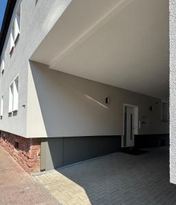 an empty room of a building with a door at Ferienwohnung Wasser - Bude in Momlingen
