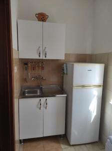 Kuchyň nebo kuchyňský kout v ubytování Maratea Home, graziosa e accogliente con spazio esterno privato, servito di bus per le spiagge
