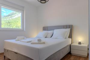 Ένα ή περισσότερα κρεβάτια σε δωμάτιο στο Residence Kelava +60 φωτογραφίες