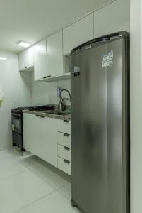 Kuchyň nebo kuchyňský kout v ubytování Apê com Vista Mar na Praia do Sul!