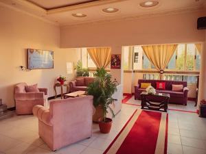 a large living room with couches and a table at Aqua Marina Ras ElBar in Ras El Bar +13 photos