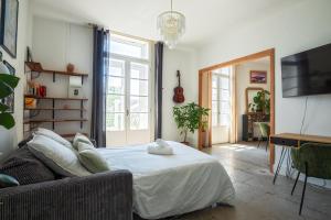 Postel nebo postele na pokoji v ubytování Centre - Marché de Noël - 5 min Place Comédie