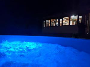 a view of the earth at night with a window at Kuća za odmor La Vi in Mrkopalj