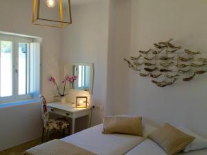 Posteľ alebo postele v izbe v ubytovaní Paros Afrodite Luxury Villas
