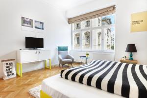 Televízia a/alebo spoločenská miestnosť v ubytovaní The Magazine Hotel